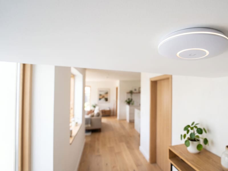 Ceiling-mounted wireless access point in a modern home
